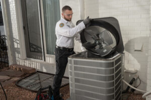 HVAC Repair Company in Clearwater, FL, technician repairing air conditioning unit.