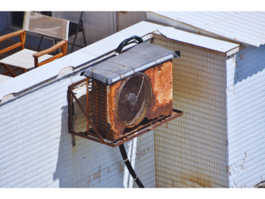 Rusted air conditioner due to salt air coastal erosion