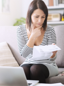 Homeowner looking over energy bill