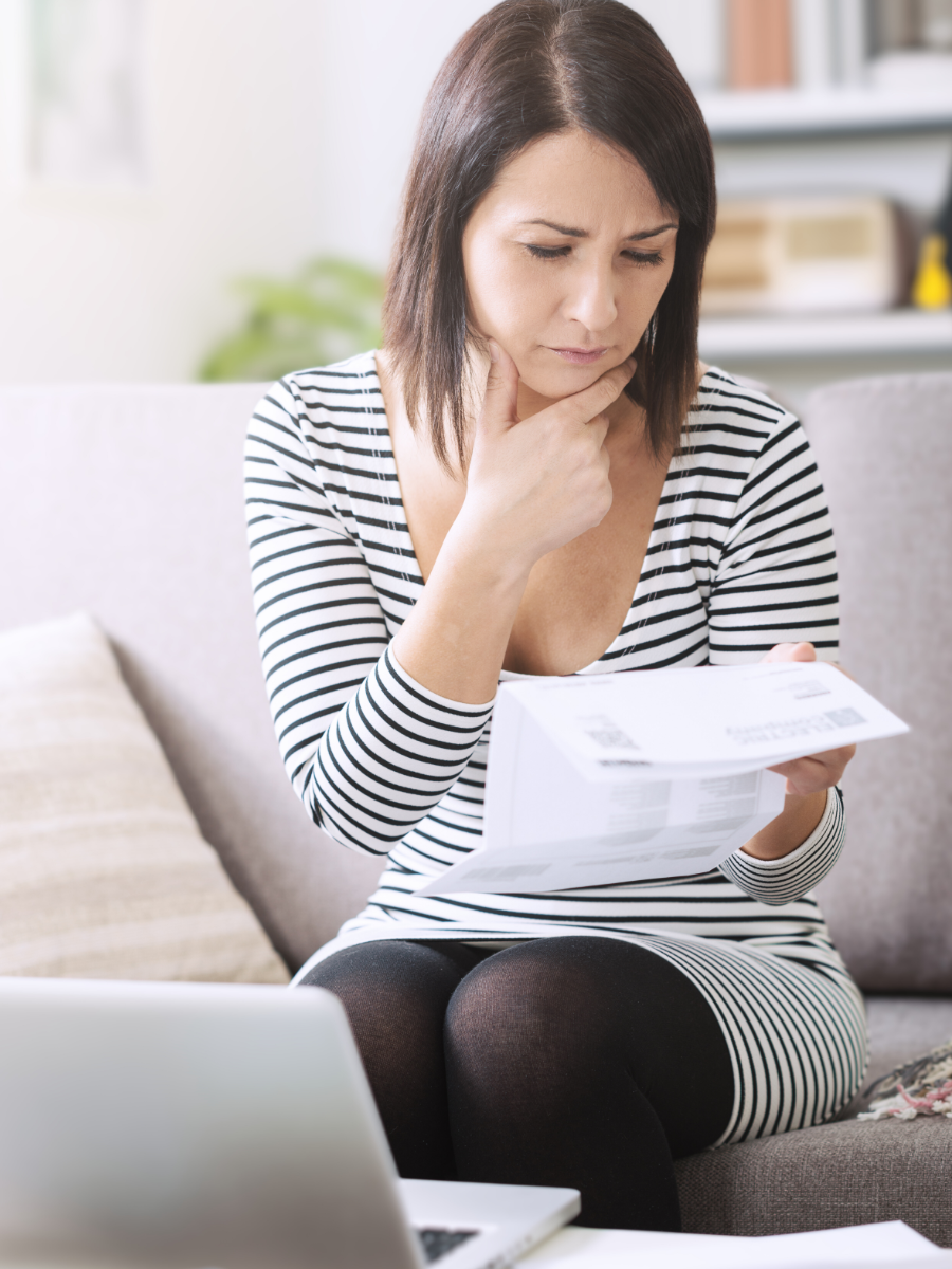 Homeowner looking over energy bill