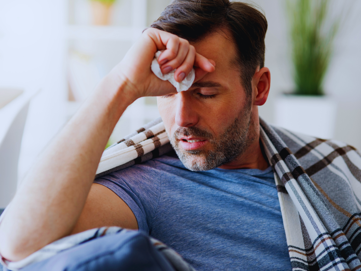 Man feeling effects on health because of refrigerant leak 